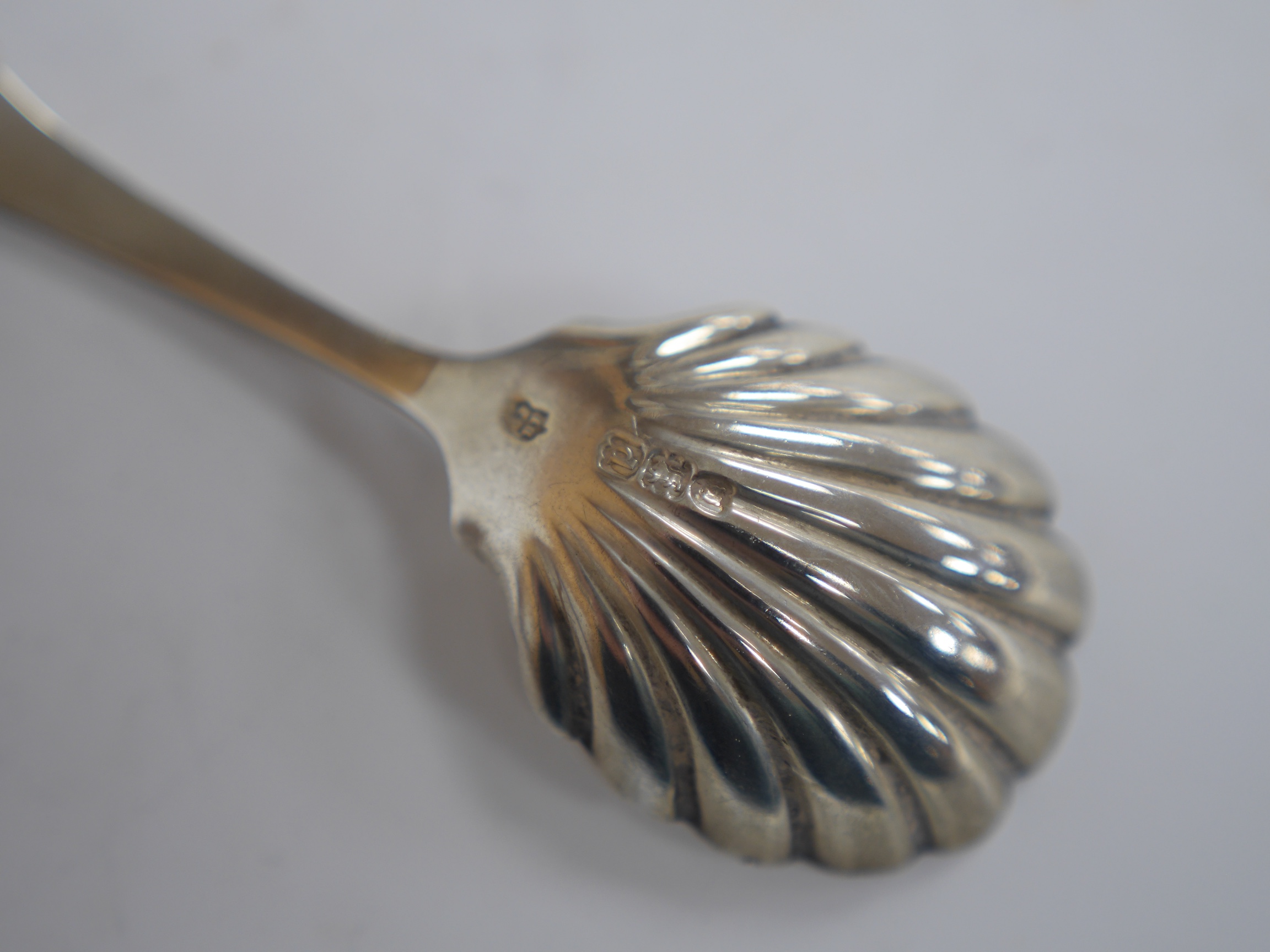 A collection of small silver including an Edwardian cylindrical pot and cover, 84mm, four 19th century caddy spoons including George IV, John Thropp, Birmingham, 1828, a small continental box modelled as a recumbent bull